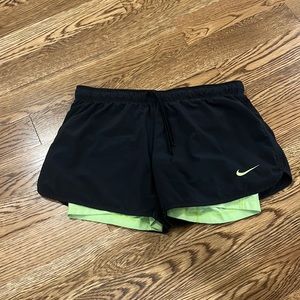 Nike shorts lined with yellow bikers